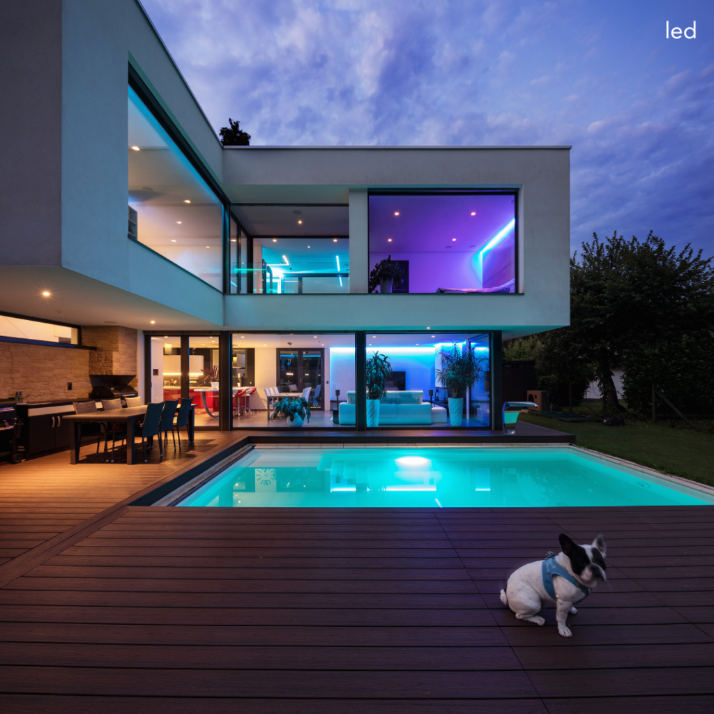 Modern house backyard illuminated with stylish LED lighting installed by Irving LED Lights.