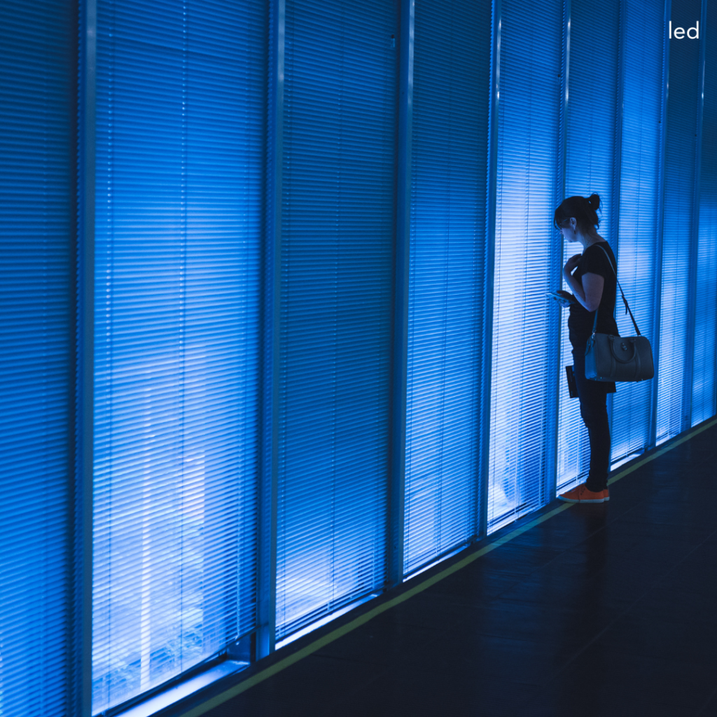 LED lights framing the windows inside a modern office building, Irving LED Lights.